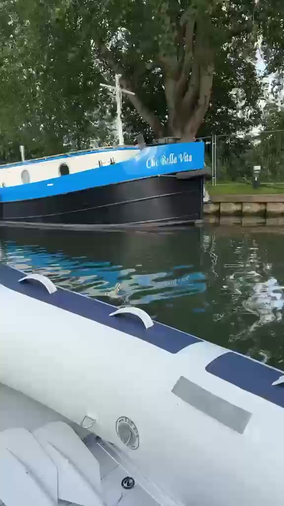 Film from the tender as it is driven past Che Bella Vita on the river