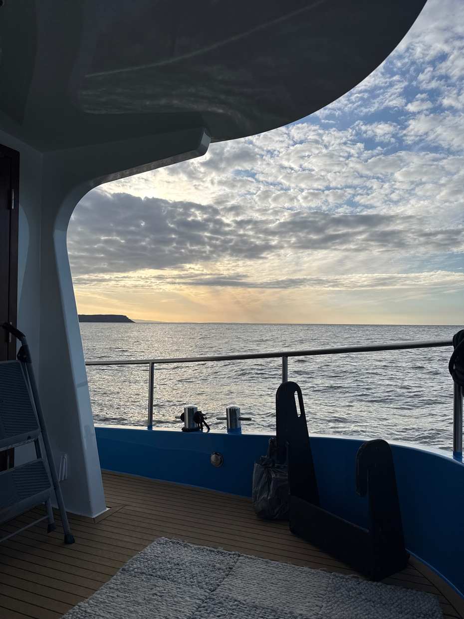 Sunset from the deck of Che Bella Vita as she heads west