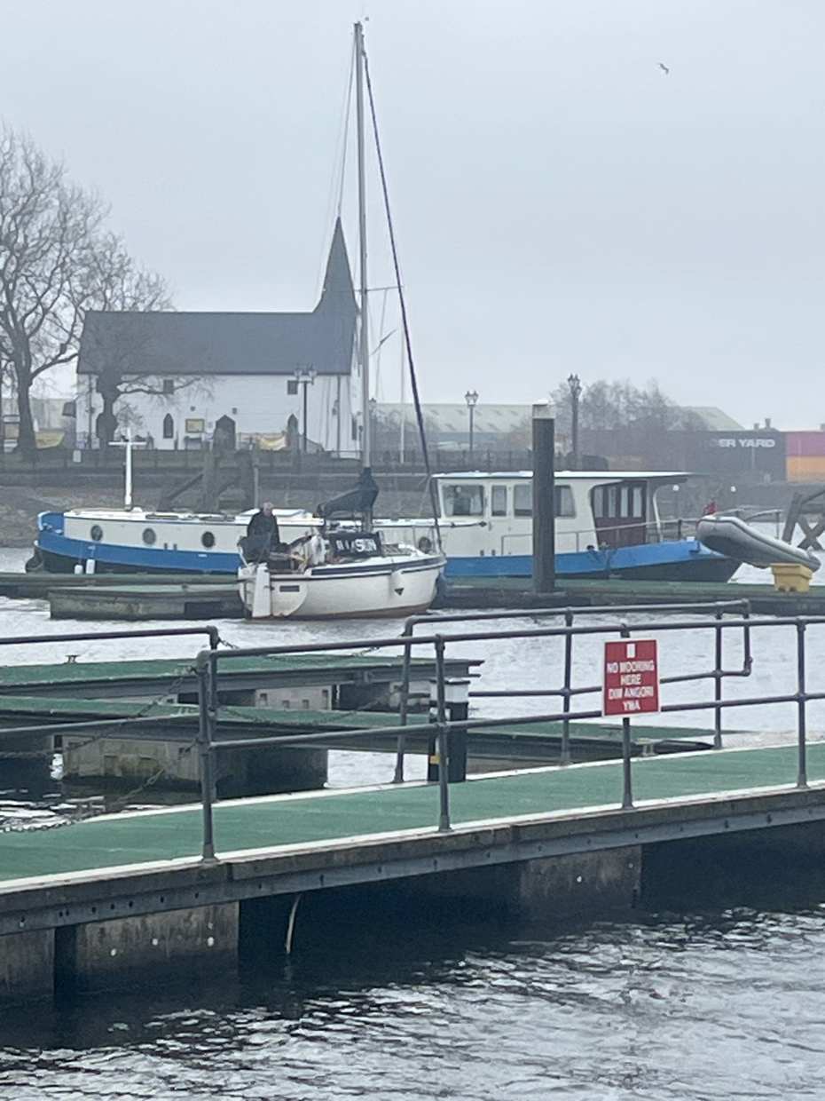 Boats moored at Cardiff Bay on a grey winter day